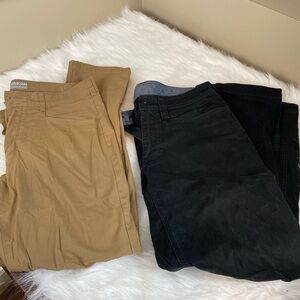 Two pair Duluth and AKHG Men's Pants in Black and Tan